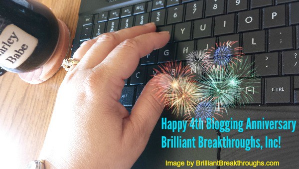 Maggie's hand typing a keyboard with fireworks and "Happy 4th Blogging Anniversary Brilliant Breakthroughs Inc!"