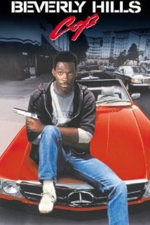 Beverly Hills Cop Movie Poster of Detective Axel Foley holding handgun while sitting on top of a red sports car.