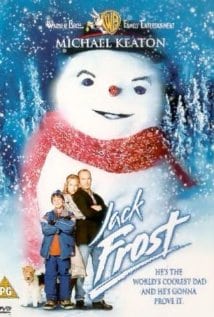 Jack Frost Movie poster with a big magical snowman and the family of Jack Frost with his wife and son in front of the snowman wearing a red scarf and black hat.