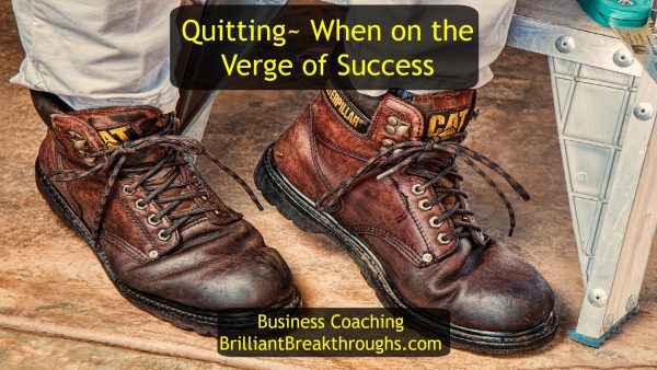 Quitting - the easy way out. Illustrated by a man's working boots worn in while in a construction workshop.