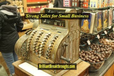 Strong sales illustrated by an elaborate antique cash register at a chocolate store.