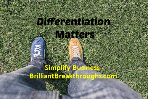Business Coaching by Brilliant Breakthroughs, Inc. Topic: Differentiation illustrated by 2 different colored shoes.